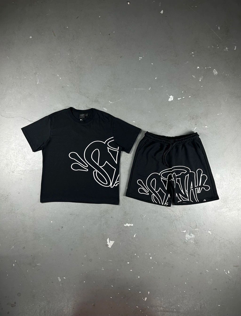 CONJUNTO SYNA WORLD IMPORTADO LOGO